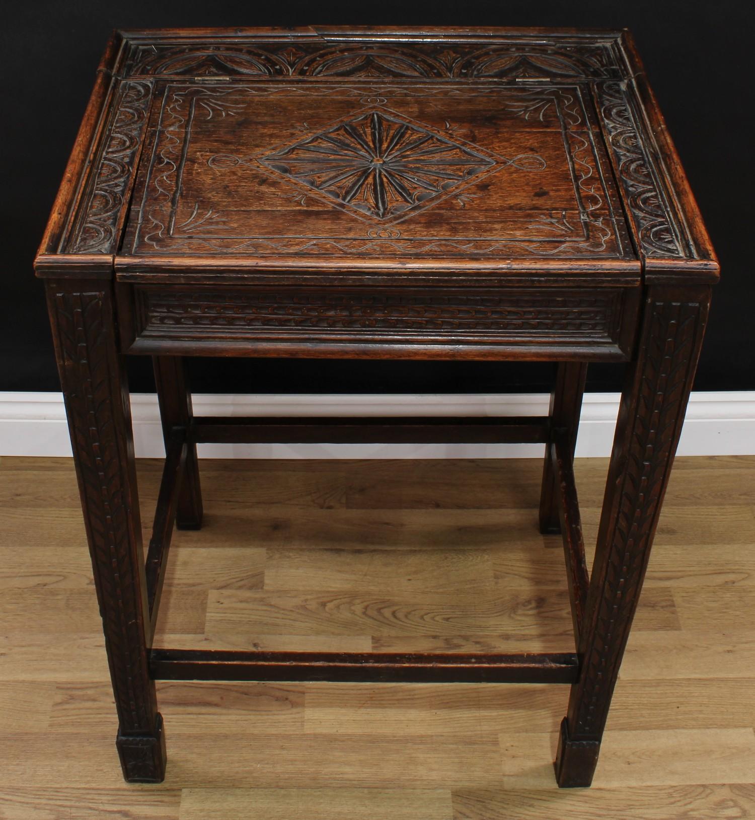 An unusual oak box or bible table, hinged rectangular top incise carved in the 17th century taste, - Bild 2 aus 4