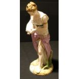 A large Continental porcelain figure, of a water carrier, 42cm high, c.1900