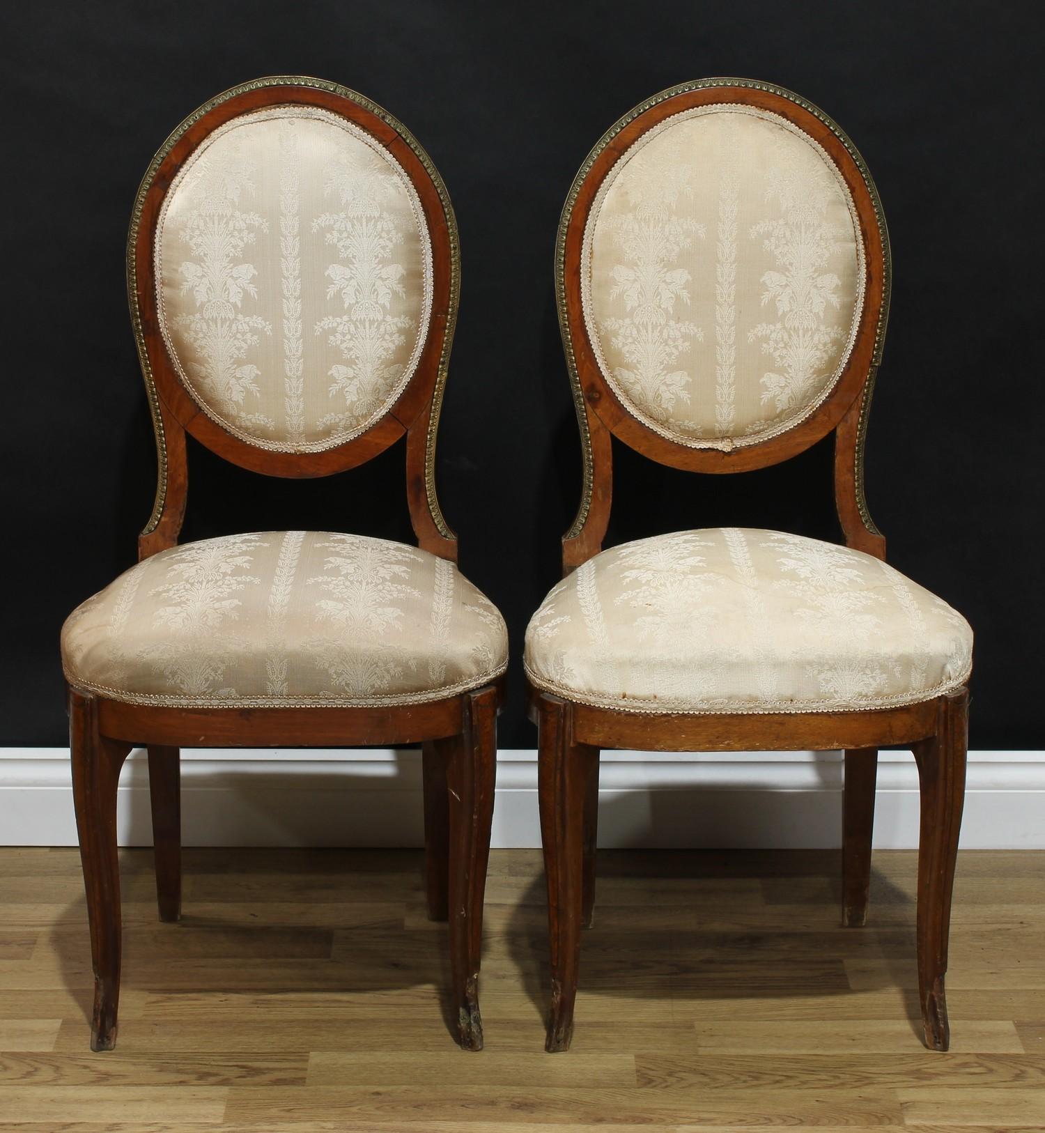 A pair of Louis XVI Revival gilt metal mounted side chairs, stuffed over upholstery, 95cm high, 46cm - Bild 2 aus 2