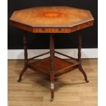 An Edwardian mahogany centre table, octagonal top with moulded edge inlaid with a central bat wing
