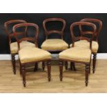 A set of five Victorian mahogany balloon-back dining chairs, 86cm high, 47cm wide, the seat 43cm