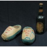 A pair of World War II hand painted miniature clogs, with the English and French flags, dated