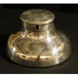 A large George V silver inkwell, the hinged cover with provision for a Goliath pocket watch, 15cm