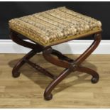 A William IV mahogany X-frame stool, stuffed-over upholstery, scroll end supports applied with