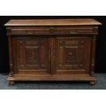 A French Renaissance style oak half cabinet, rectangular top with moulded edge above a pair of