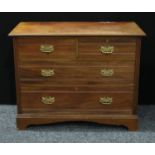 An early 20th century mahogany chest, oversailing rectangular top above two short and two long