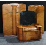 A mid-20th century Supersuite walnut veneered three piece bedroom suite, comprising dressing table