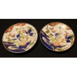 A pair of late 18th/early 19th century plates, decorated in the Imari palette