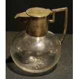 An Edwardian E.P.N.S mounted compressed globular whisky jug, hinged cover, star-cut base, c.1910