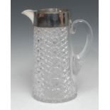 A substantial Victorian silver mounted hobnail-cut lemonade jug, scroll handle, star-cut base,