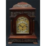 A late Victorian mahogany musical bracket clock, 14cm arched silvered dial inscribed Ollivant &