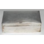 A large Edwardian silver rectangular cigar box, hinged cover enclosing three compartments, cedar