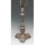 An early 20th century silver plate on copper table lamp, acanthus grasped fluted pillar and socle,