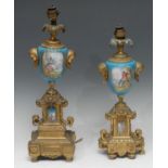 A 19th century French gilt metal and porcelain ovoid table lamp, in the Louis XVI taste, painted