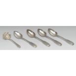 A set of four George III Scottish silver Fiddle and Shell pattern table spoons, Jonathan Millidge,