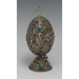 A Russian malachite mounted silver coloured metal filigree egg, fross finial, domed base, 15cm high,
