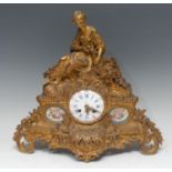 A 19th century French gilt-metal and porcelain mounted mantel clock, 6.5cm circular enamel dial