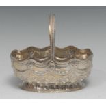 A Victorian silver oval swing-handled sweetmeat basket, chased with ribbon-tied swags above a band