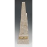 A marble and composition library obelisk, 44.5cm high