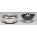 A silver wine coaster, black hardstone base, London 2006; a small horn bowl with silver pedestal