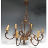 A Louis XV style six branch electrolier, cast throughout in the Rococo taste with scrolling