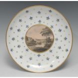 A Derby circular plate, circular panel with sepia landscape on a peach ground, the rim with