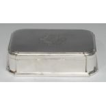 A large George V silver shaped rectangular dressing table jewellery casket, in the early 18th