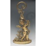 A Rococo Revival brass door stop, cast as a scantily clad putto gathering grapes, posted handle, D-