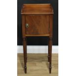 A George III mahogany bedroom cabinet, rectangular top with three-quarter gallery above a door,