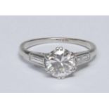 A diamond solitaire ring, round brilliant cut diamond measuring approximately 6.79mm x 6.69mm x 4.