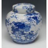 A Japanese ovoid ginger jar, well-painted with swallows, chrysanthemums, cherry blossom and leafy
