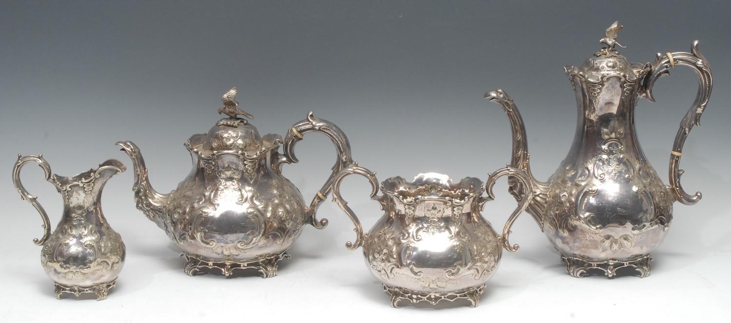 A Victorian Rococo Revival E.P.N.S four piece tea and coffee service, comprising baluster teapot,