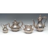 A Victorian Rococo Revival E.P.N.S four piece tea and coffee service, comprising baluster teapot,