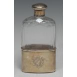 A Victorian silver and clear glass hip flask, screw-fitting cover, stirrup cup to base, 15cm long,