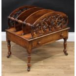 A late Victorian mahogany three section Canterbury, each shaped end division pierced with