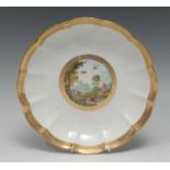 A Derby shaped circular dessert dish, painted by George Complin, with fancy birds in a landscape,