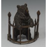 A 19th century brown patinated bronze novelty inkwell, as a Russian bear, on hind legs behing