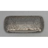 A Victorian silver rounded rectangular snuff box, engraved overall with scrolling foliage, flush-