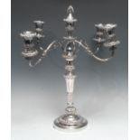 A silver plated four branch five light candelabrum