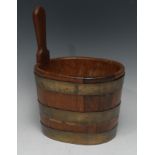 Treen - a 19th century oak dairy piggin, of staved and coopered construction, 28cm over handle