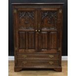 Frank Pratt of Derby - a 17th century style oak press cupboard or hall robe, rectangular top with