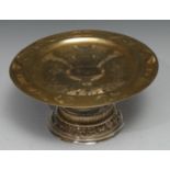 An 18th century Russian silver-gilt tazza, the dished circular plateau engraved with the Adoration