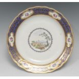 A Derby porcelain shaped circular plate, painted by Zachariah Boreman, with bridge and church in