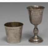 A Victorian silver goblet, bell shaped bowl engraved with buildings and a sailing boat, knopped