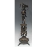 A 19th century Grand Tour brown patinated library bronze, cast as a pillared arrangement of Atlas