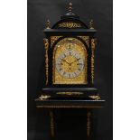 A substantial Victorian gilt metal mounted ebonised musical bracket clock, in the George II taste,