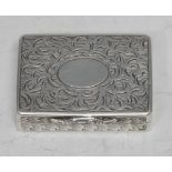 A Victorian silver rounded rectangular vinaigrette, bright-cut engraved with stiff leaves, hinged