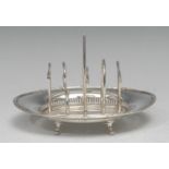 A Victorian E.P.N.S novelty five-bar toast rack, the divisions spelling out TOAST, pierced boat