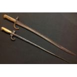 French 1866 pattern Chassepot Bayonet. Single edged fullered blade 56.5cm in length. Maker marked.