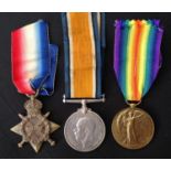 WW1 British 1914-15 Star, War Medal and Victory Medal to 1300 Gnr T Holt, RFA. Complete with